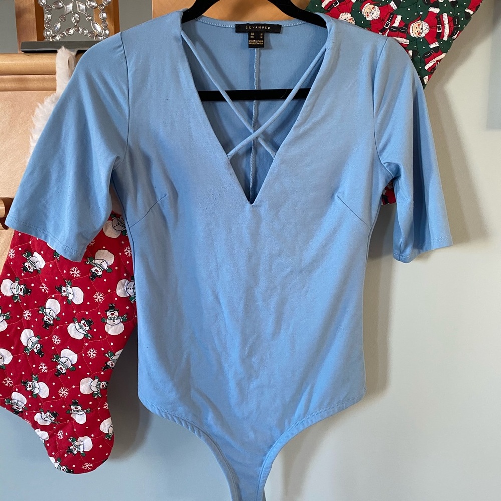 Revamped - cross front blue bodysuit
